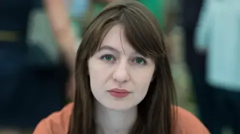 Irish author Sally Rooney claims she cannot enter the UK over arrest fears